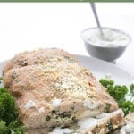 Turkey meatloaf recipe with feta and spinach, on a white plate