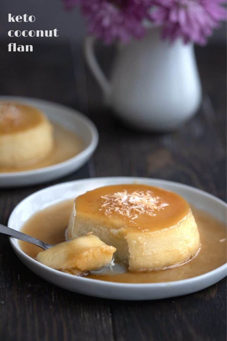 Titled image of keto coconut flan on a white plate with a spoonful taken out of it.