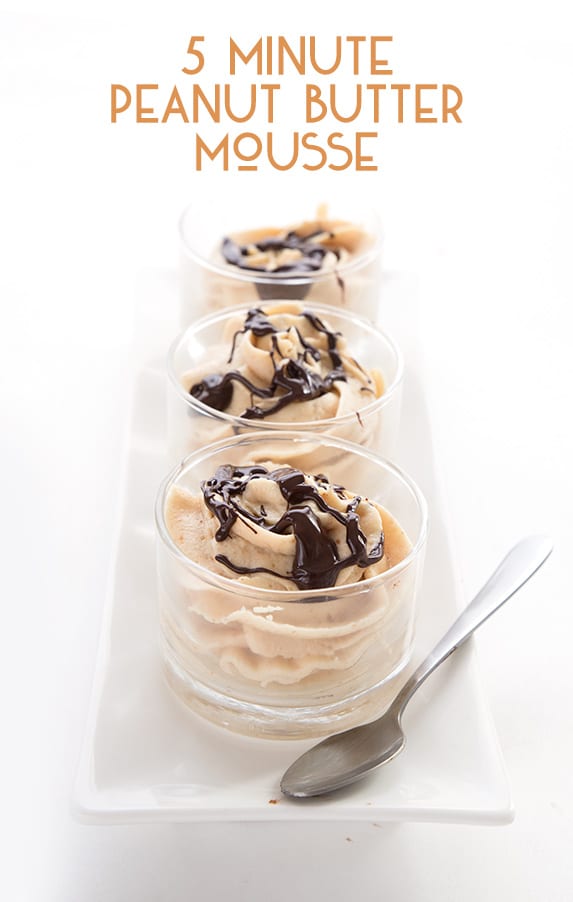 Keto Peanut Butter Mousse in small dessert cups with chocolate sauce