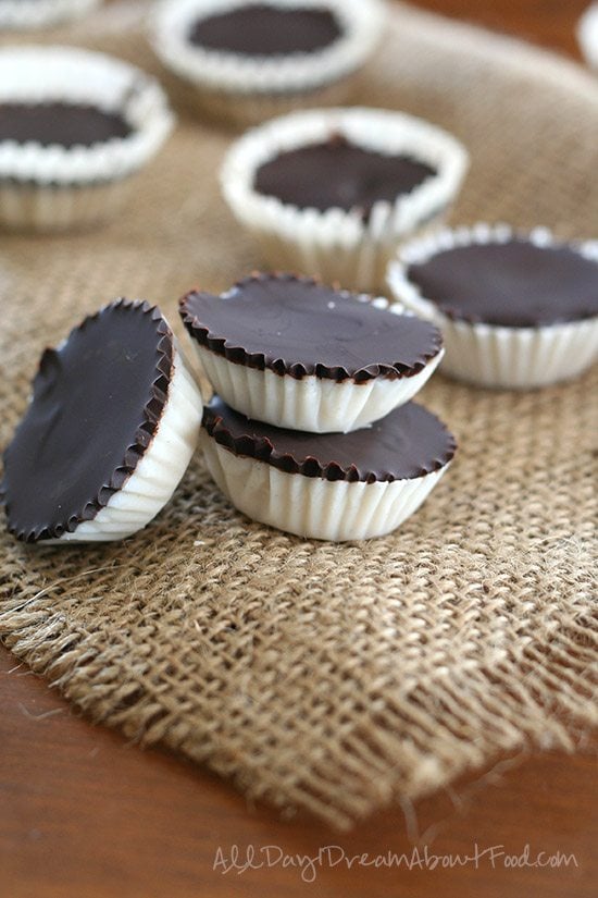 sugar-free no bake Chocolate Coconut Cups arranged on a piece of burlap