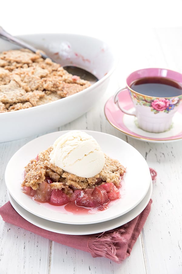 A serving of sugar-free rhubarb crisp with a cup of coffee