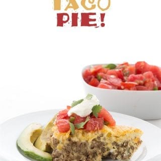 Low Carb Taco Pie - a slice on a plate with salsa behind.