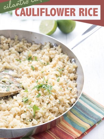 Cilantro lime cauliflower rice in a pan on a white table.