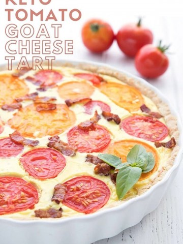 Titled image of goat cheese tart with tomatoes and bacon, in a white tart pan.