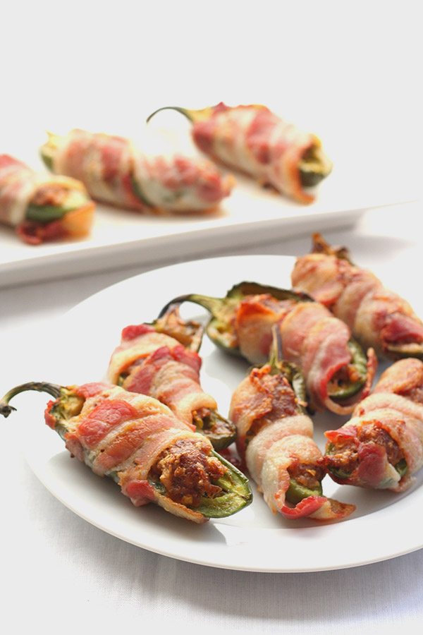 Low carb jalapeño poppers stuffed with spicy chorizo and sharp cheddar and wrapped in bacon