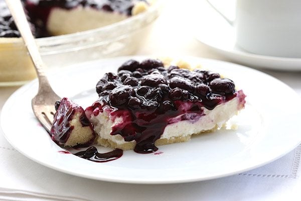 Close up photo of keto blueberry cheesecake slice