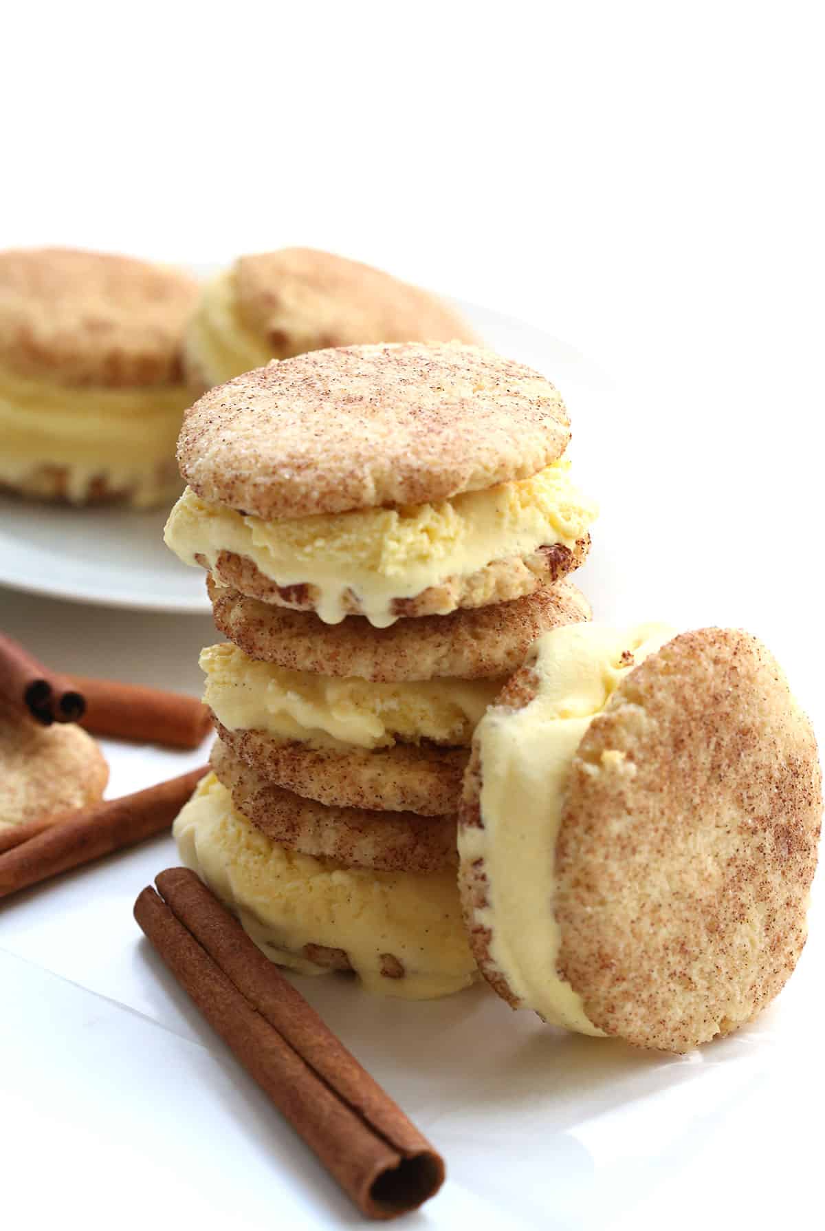 A stack of keto ice cream sandwiches with sticks of cinnamon