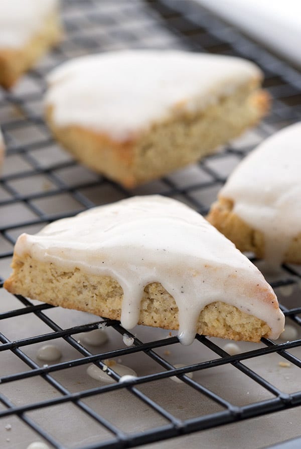 Close up of keto vanilla bean scones on a baking rack