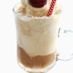 Titled Pinterest image of a keto sugar free root beer float in a tall glass with a red straw.
