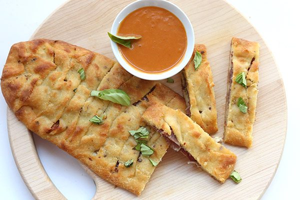 You know you want some. Low carb keto stromboli recipe made with mozzarella dough.