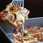 This easy pan pizza is low carb and THM friendly. It's so easy, you can have your kids make it for you!