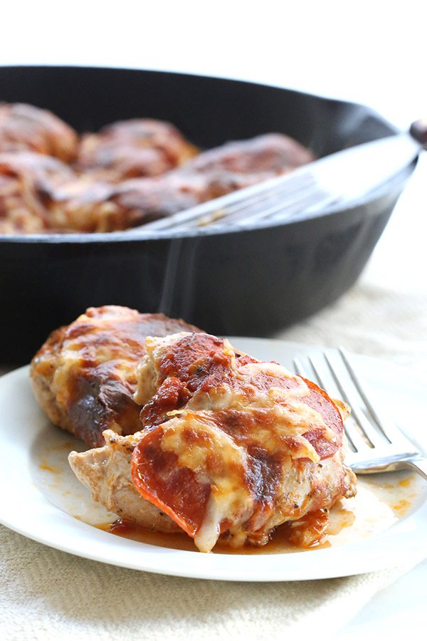 Low carb keto pizza chicken - chicken thighs smothered in tomato sauce, pepperoni and cheese!