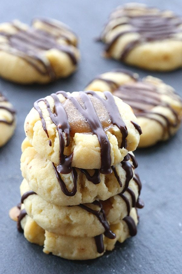 Twix thumbprints - low carb shortbread filled with sugar-free caramel and drizzled with chocolate. 