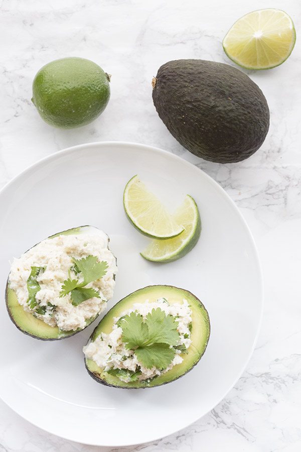 It only takes minutes to make this delicious and healthy low carb crab stuffed avocado.