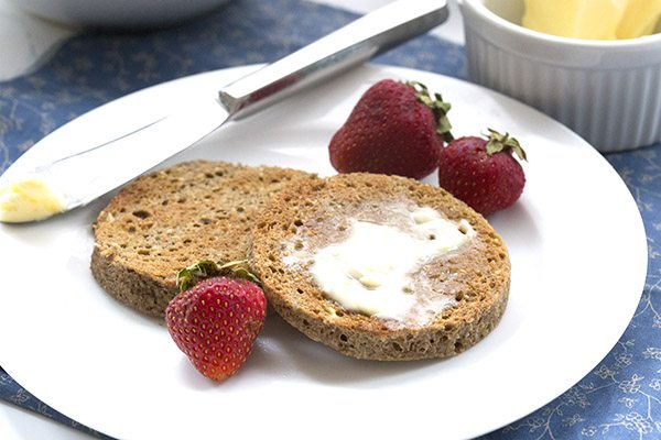 Low carb, grain-free English muffins with butter. Best keto breakfast ever! Nut-free, can be dairy-free and paleo friendly.