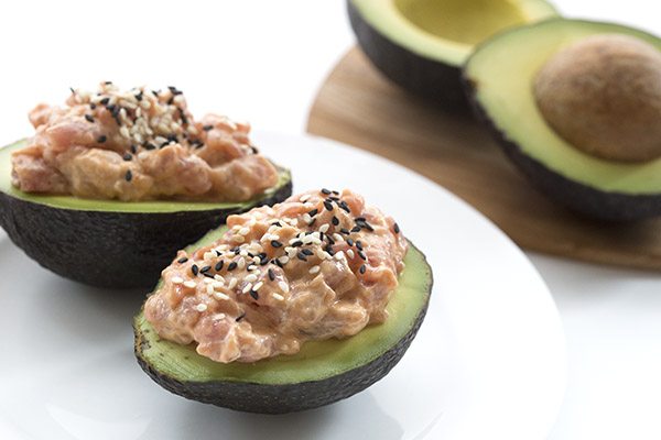 Easy low carb spicy tuna stuffed avocados. 