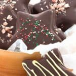 Titled image of keto peppermint star cookies on a white table.