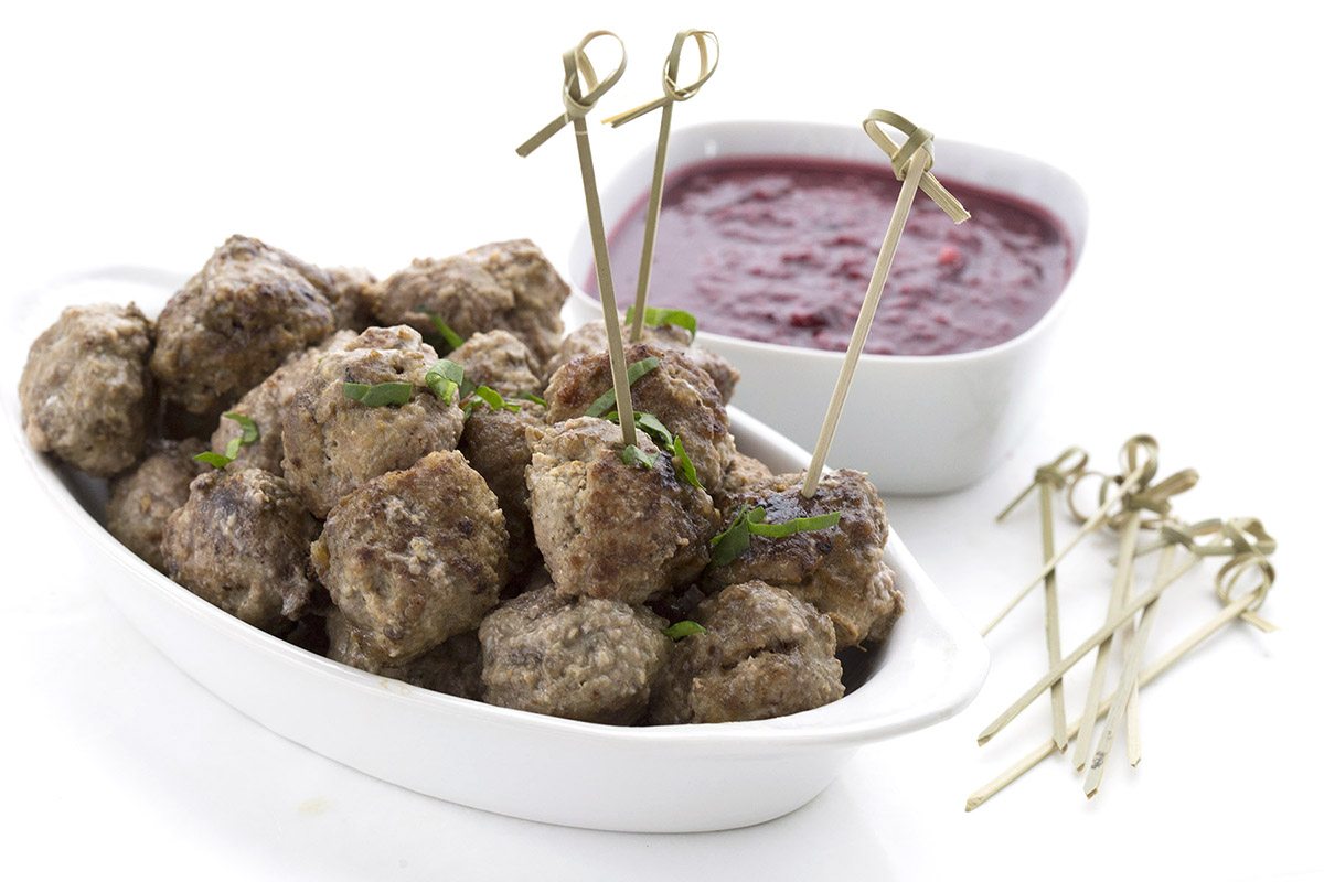 Fun and festive, a perfect low carb holiday appetizer. Slow Cooker Meatballs with Raspberry Dipping Sauce