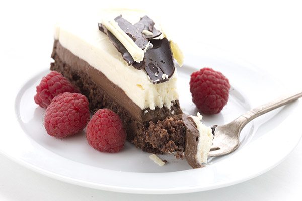 Dig into this gorgeous creamy triple chocolate mousse cake. Sugar-free and grain-free. 
