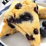 Titled image of two keto blueberry scones on a white plate.