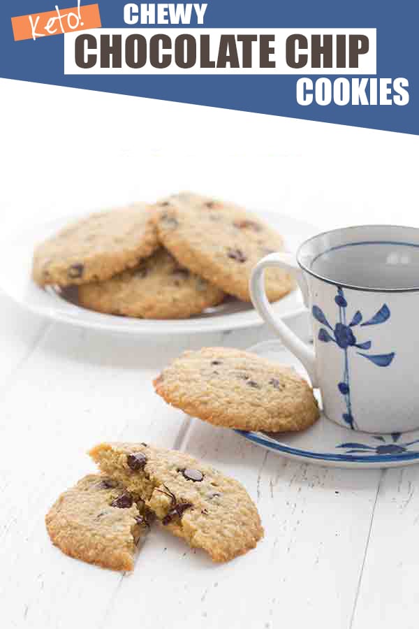 Chewy low carb chocolate chip cookies on a white table with a cup of coffee