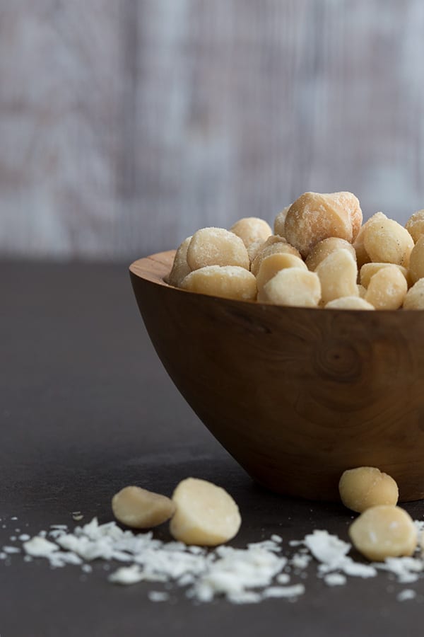 Macadamia nuts and coconut in a wooden bowl