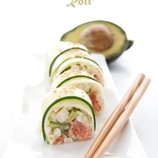 Keto Sushi wrapped in thinly sliced cucumber on a white platter