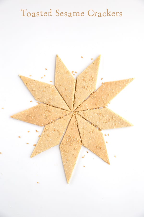 Keto Sesame Crackers in a star pattern with sesame seeds