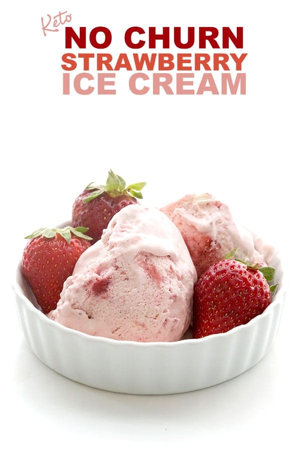 Easy Keto Strawberry Ice Cream in a white dish with strawberries around it.