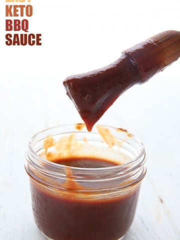 Sugar Free BBQ Sauce in a jar, with a brush above it