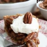 Titled image of a slice of Keto Pecan Pie on a red patterned plate.