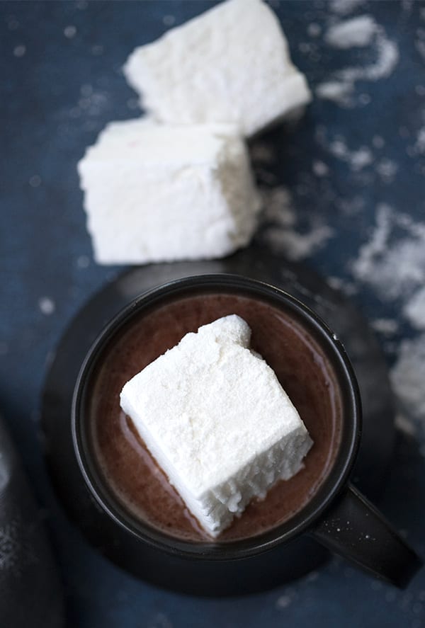 Top down photo of sugar free homemade marshmallows in low carb hot chocolate