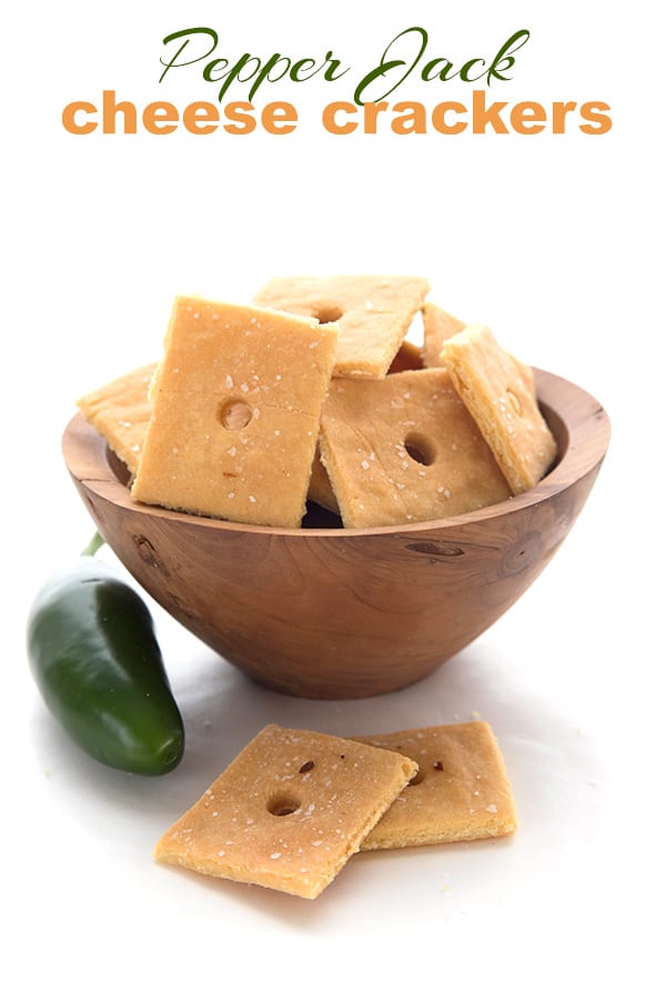 Keto Pepper Jack Crackers in a wooden bowl