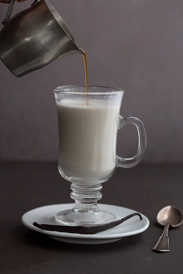 Espresso being poured into a white chocolate mocha