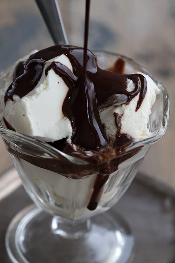 Close up of keto ice cream with sugar free chocolate syrup