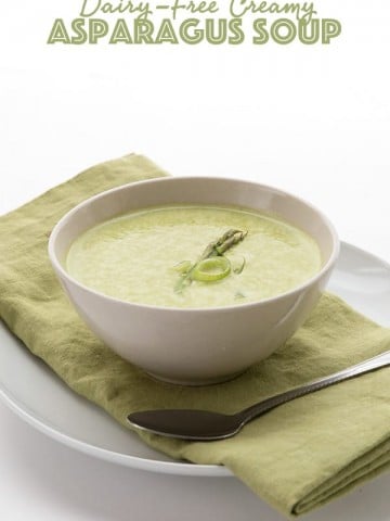 Dairy Free Cream of Asparagus Soup in a bowl with a green napkin