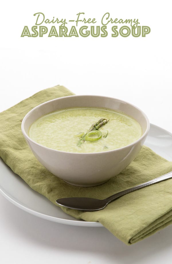 Dairy Free Cream of Asparagus Soup in a bowl with a green napkin