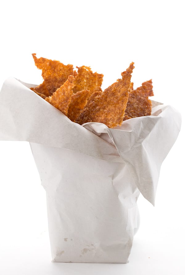 Low carb tortilla chips in a paper bag