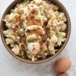 Top down photo of cauliflower salad in a brown bowl