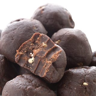 Close up shot of brownie fat bombs with a bite taken out
