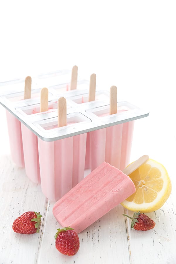 Dairy-Free Keto Popsicles in the popsicle mold with one in front