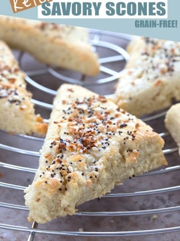 Savory keto scones with everything bagel seasoning on a cooling rack