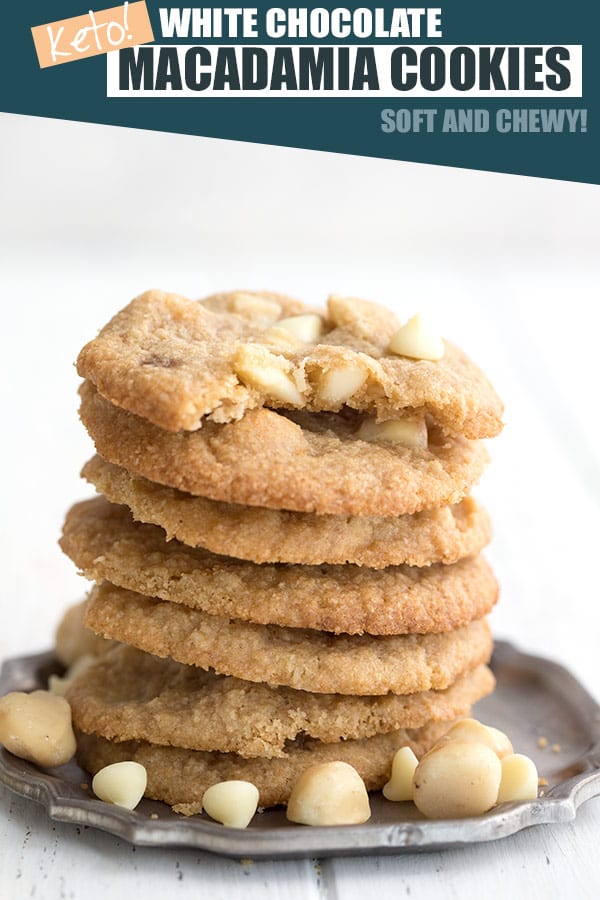 White chocolate chip macadamia nut cookies in a stack on a pewter plate
