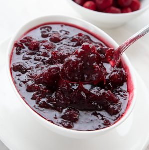 Sugar Free Cranberry Sauce in a white oval bowl.