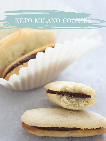 Title image of homemade keto milano cookies in a pile, and one has a bite taken out of it.