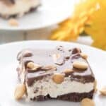Titled image of a Copycat DQ Keto Buster Bar on a white plate over a teal napkin.