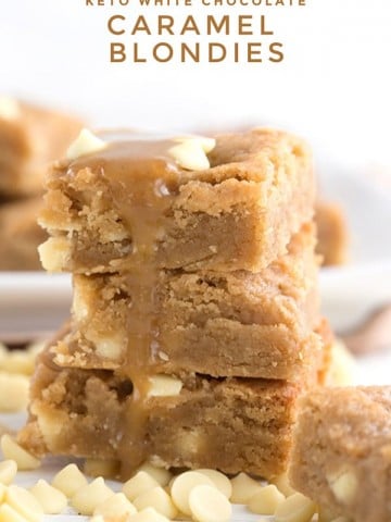 Titled image of caramel blondies with chocolate chips, in a stack, with white chocolate chips in the foreground.