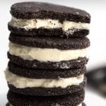 Close up shot of keto oreo cookies with a bite taken out of the top cookie