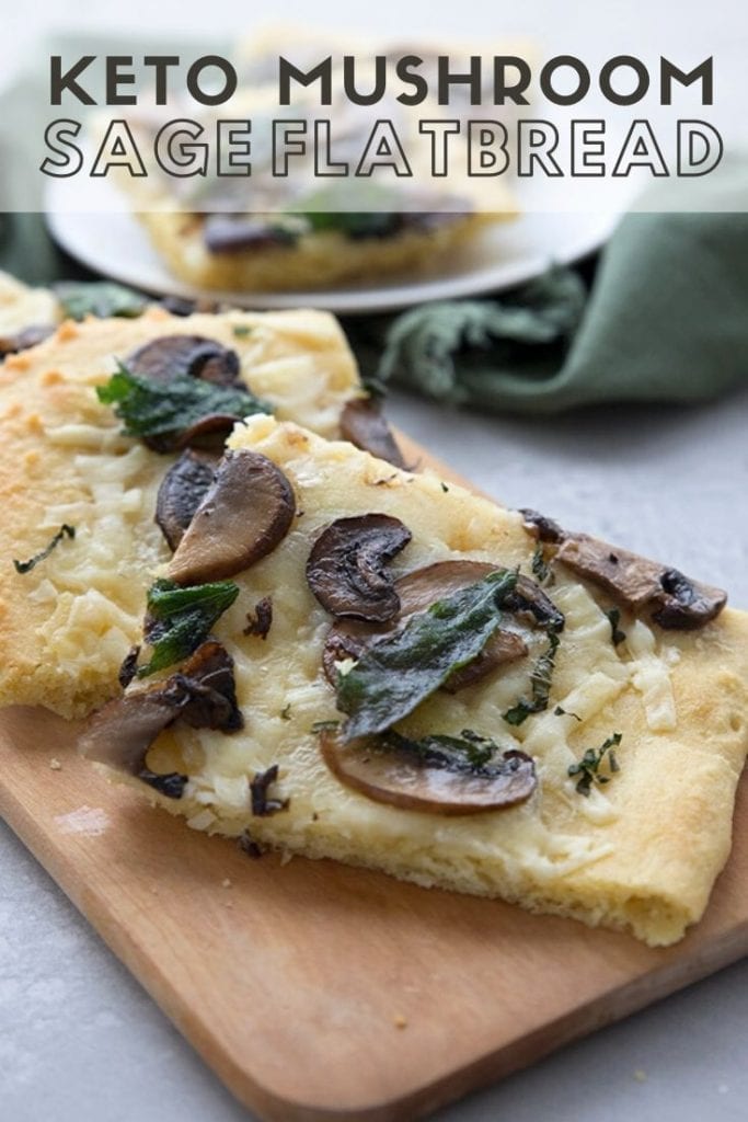 Titled image of keto flatbread with mushrooms and age on a wooden cutting board.