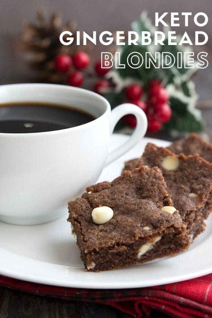 Titled image of Keto Gingerbread Blondies on a white plate beside a cup of coffee